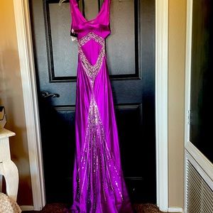 Beautiful purple prom dress. Worn one time.